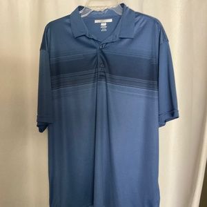 Greg Norman golf shirt.